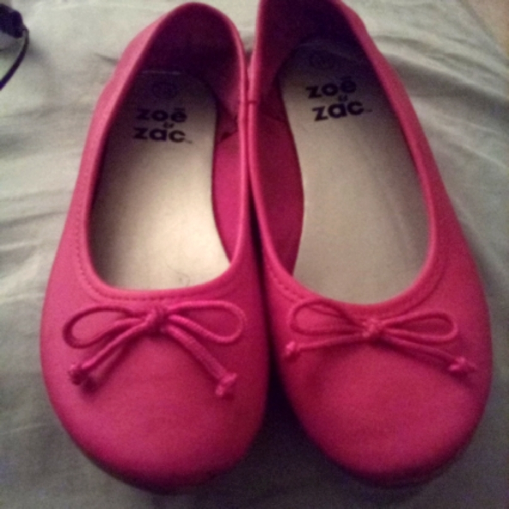 I am selling pink ballet slip ons for girls.